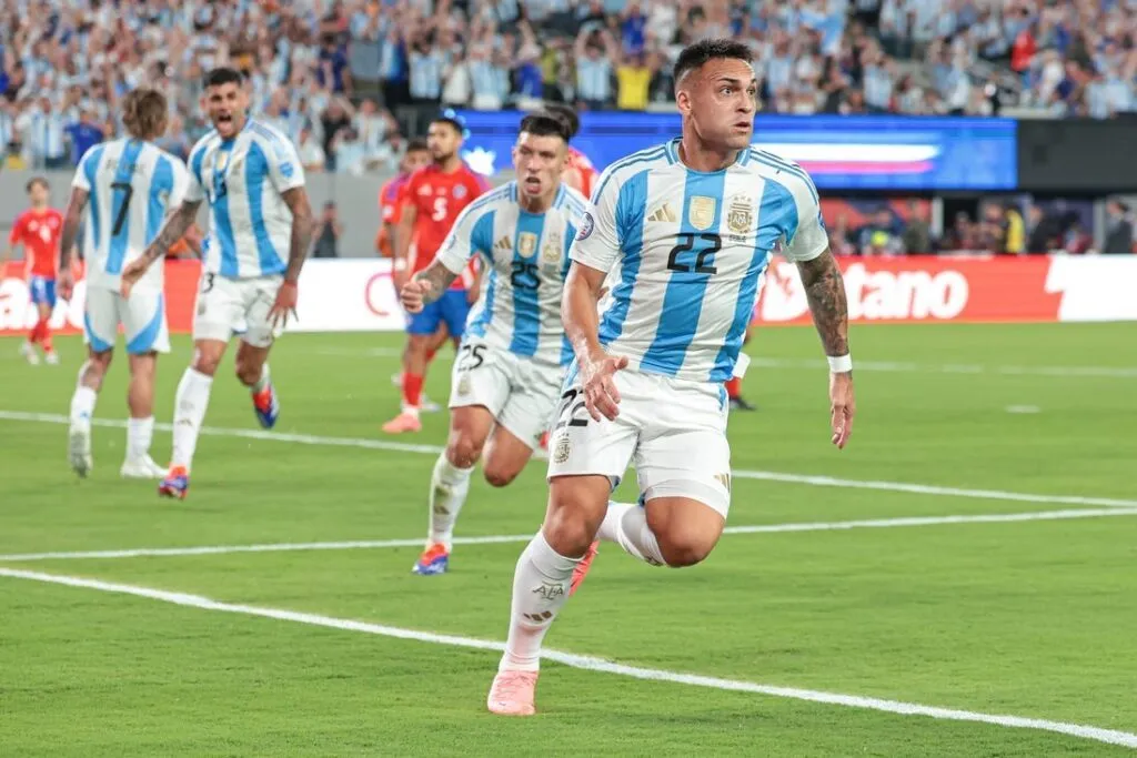 Lautaro Martínez celebrates in Argentina's number 22 shirt
