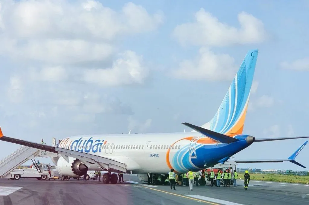 A flydubai Boeing 737 on the tarmac with emergency crews nearby