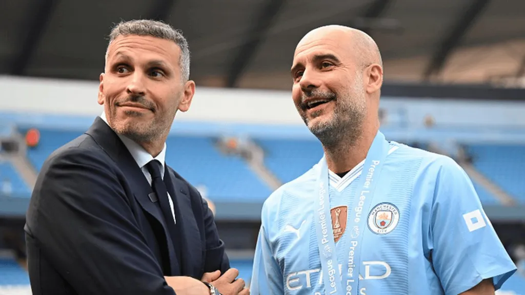 Manchester City chairman Khaldoon Al Mubarak with Pep Guardiola at the Etihad Stadium