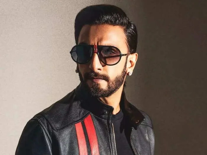 Ranveer Singh wearing sunglasses and a leather jacket