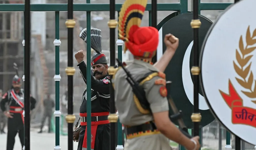 BSF and Pakistan Rangers personnel at the India-Pakistan border gate during the flag ceremony