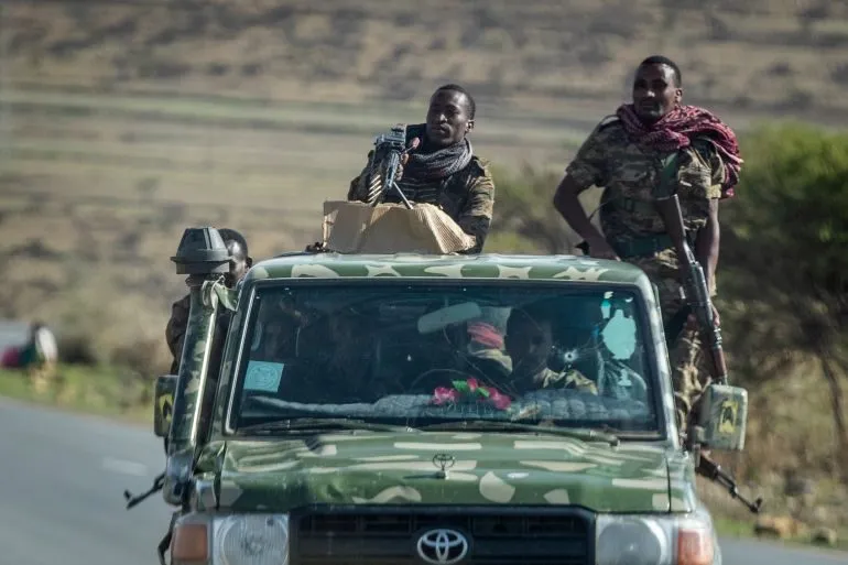 Armed fighters in a pickup truck during the Tigray conflict in Ethiopia