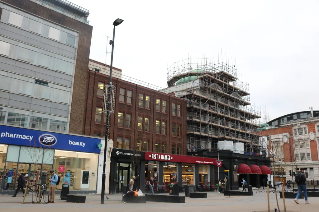 Boots, VisionDirect and Pret A Manger shops on a British high street