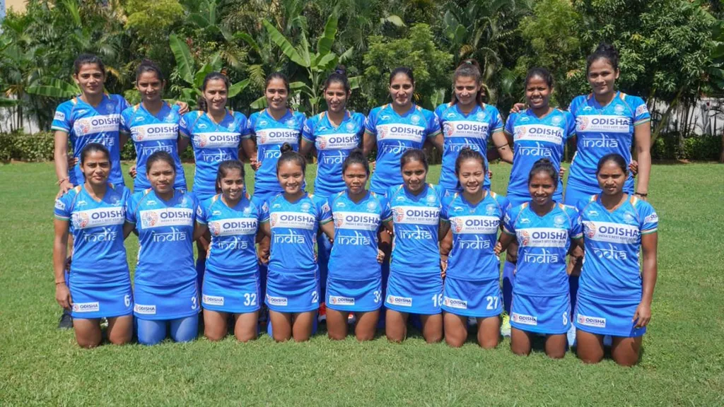 India women's national field hockey team in blue India jerseys posing for a team photograph